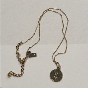 Late Spade “e” necklace in gold!